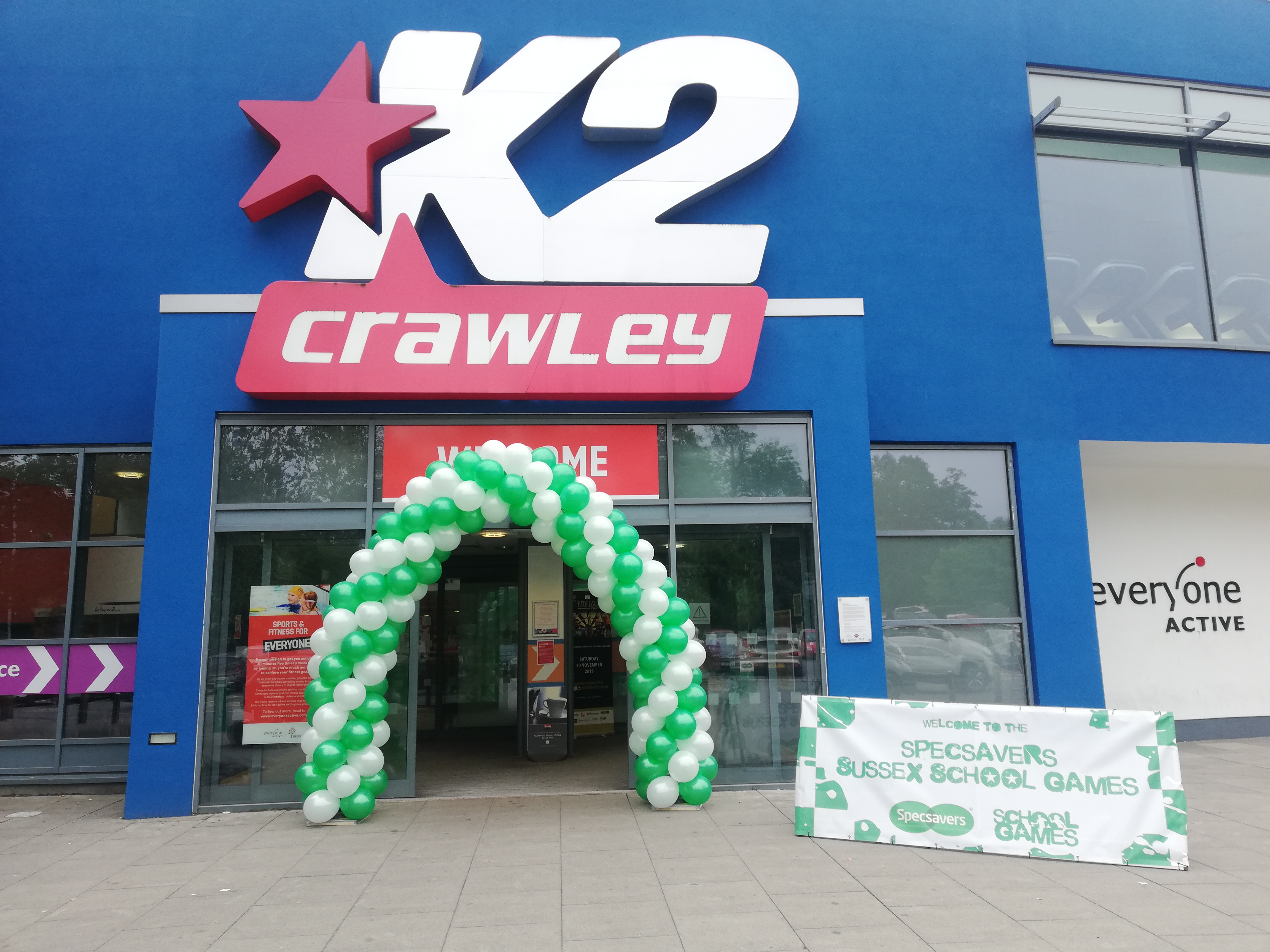 Green and White Spiral Balloon Arch Created for the Specsavers Sussex School Games